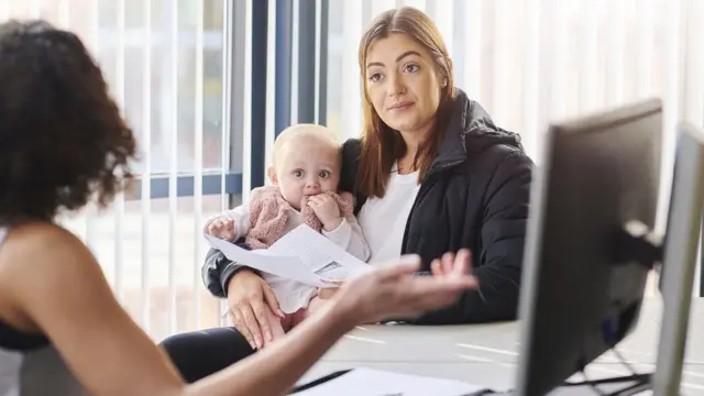 File image of a mother and her child talking to someone