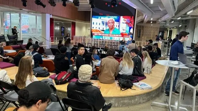 Students at a watch party in California