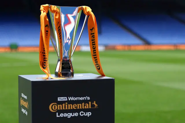 Continental Leaue Cup stands on a plinth at the edge of the pitch.