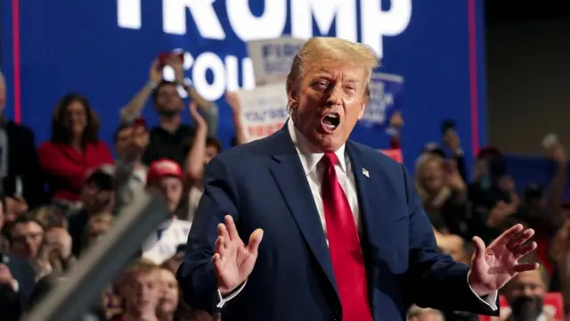 Republican presidential candidate and former U.S. President Donald Trump gestures on stage during a campaign rally in Richmond, Virginia, U.S. March 2, 2024.