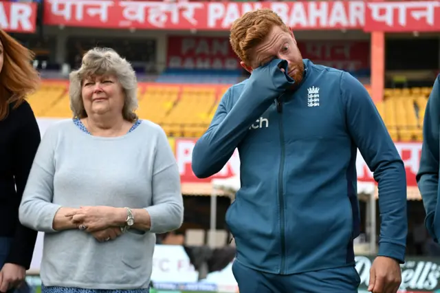 England's Jonny Bairstow wipes away tears during his 100th Test cap presentaton