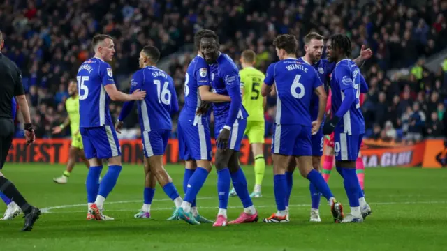 Famara Diedhiou of Cardiff City FC scores against Huddersfield Town