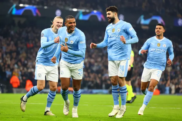 Manuel Akanji celebrates scoring a goal with his Manchester City team-mates