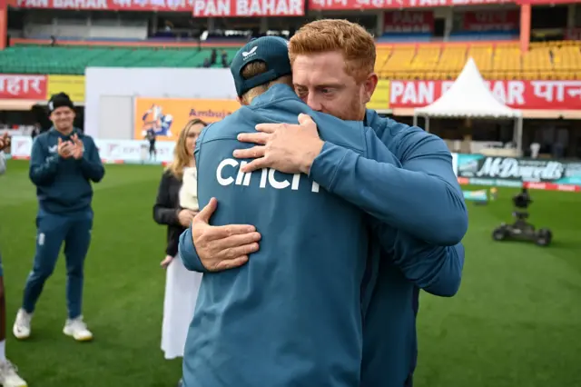 England's Jonny Bairstow hugs Joe Root during his 100th Test cap presentaton