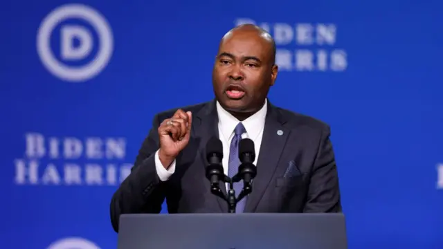 Jamie Harrison speaking at a DNC meeting in February