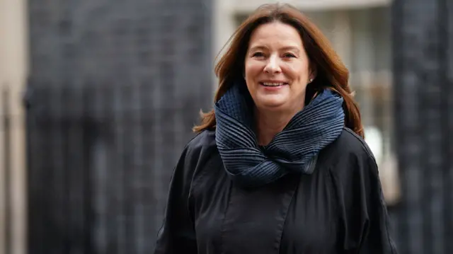 Gillian Keegan walking outside Downing Street wearing black