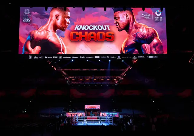 Big screen showing images of Anthony Joshua and Francis Ngannou