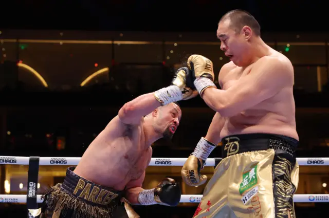 Joseph Parker throws a punch at Zhilei Zhang