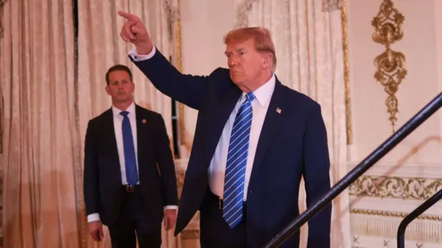 Republican presidential candidate, former President Donald Trump greets supporters after speaking at an election-night watch party at Mar-a-Lago on March 5, 2024 in West Palm Beach, Florida