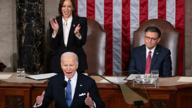 US President Joe Biden (C) delivers his State of the Union address before a joint session of Congress as US Speaker of the House Mike Johnson (R), and US Vice President Kamala Harris (L), listen, on the floor of the US House of Representatives, on Capitol Hill in Washington, DC, USA, 07 March 2024.