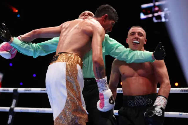 Nick Ball and Rey Vargas being separated by the referee