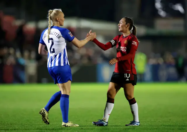 Zelem and Thorisdottir shake hands at full time.