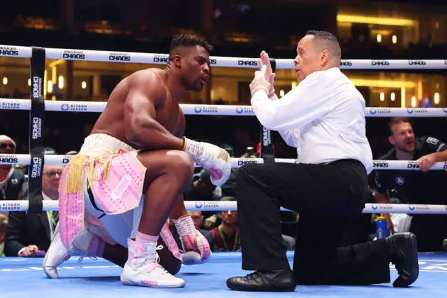 Francis Ngannou on the canvas