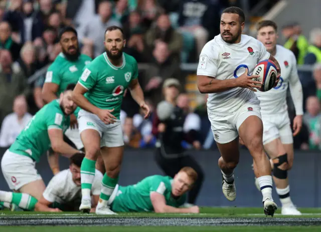 Lawrence running with the ball over try line