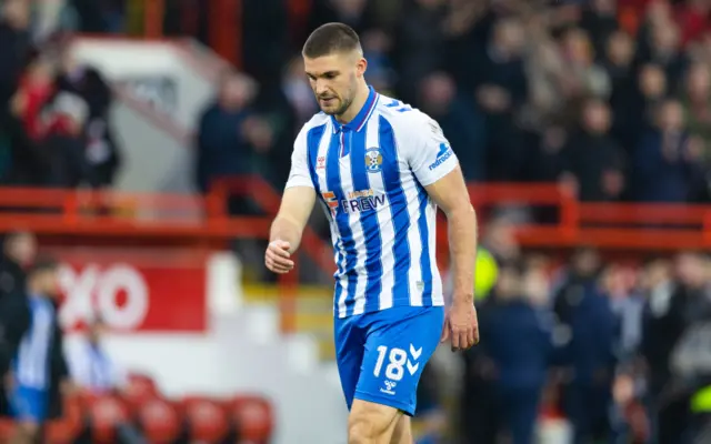 Kilmarnock's Innes Cameron looks dejected at full time during a Scottish Cup Quarter Final match between Aberdeen and Kilmarnock at Pittodrie Stadium, on March 09, 2024, in Aberdeen, Scotland.