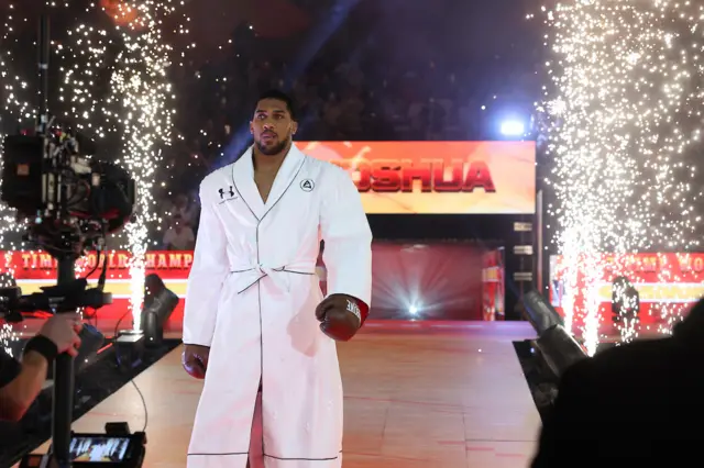 Anthony Joshua walks to the ring