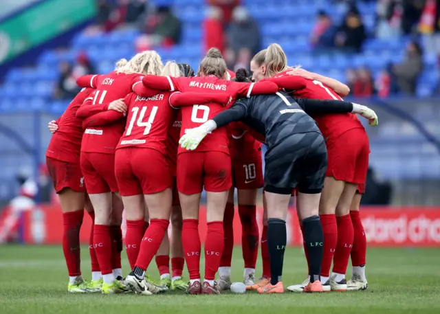 Liverpool players huddle