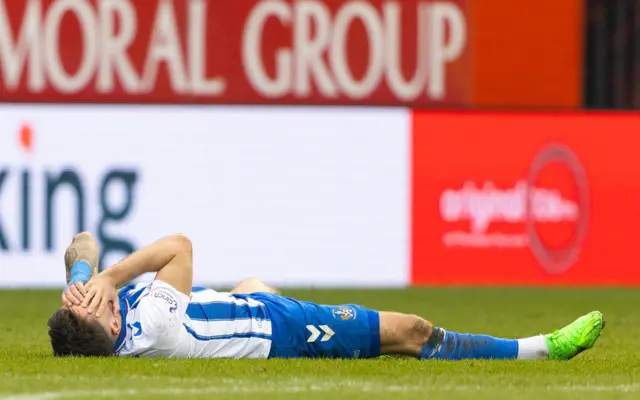 Kilmarnock's Daniel Armstrong lies on the pitch during a Scottish Cup Quarter Final match between Aberdeen and Kilmarnock at Pittodrie Stadium, on March 09, 2024, in Aberdeen, Scotland.