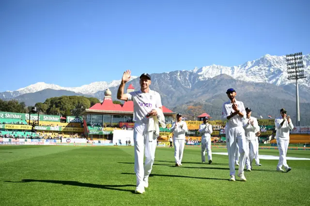 James Anderson acknowledges the crowd after taking his 700th Test wicket