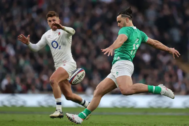 James Lowe kicking the ball