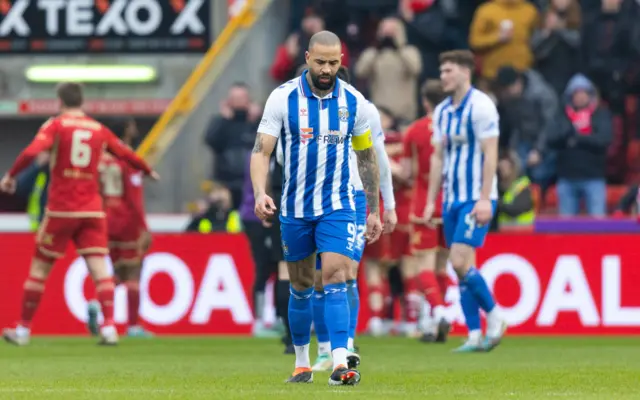 Kilmarnock's Kyle Vassell looks dejected at Kilmarnock go 3-1 down during a Scottish Cup Quarter Final match between Aberdeen and Kilmarnock at Pittodrie Stadium, on March 09, 2024, in Aberdeen, Scotland.