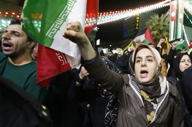 Iranians attend an anti-Israel protest at Palestine square in Tehran