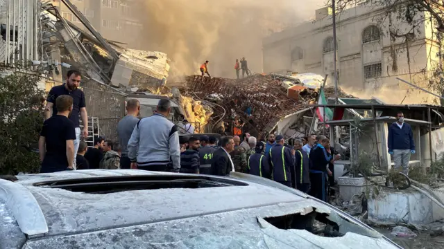 Smoke rises after what the Iranian media said was an Israeli strike on a building close to the Iranian embassy in Damascus, Syria