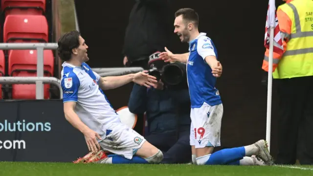 Ryan Hedges celebrates his goal with a team-mate