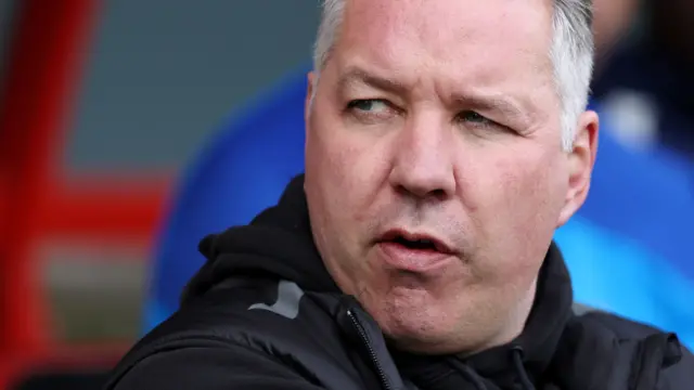 Darren Ferguson looks on