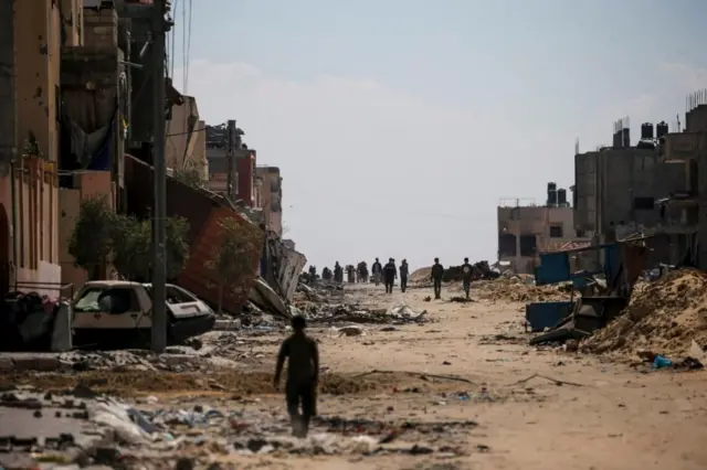 Palestinians are returning to the city of Khan Younis, where heavy fighting has left buildings in ruins