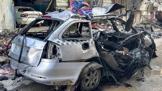 The car in which three sons of Hamas leader Ismail Haniyeh were reportedly killed in an Israeli air strike is pictured in al-Shati camp, west of Gaza City