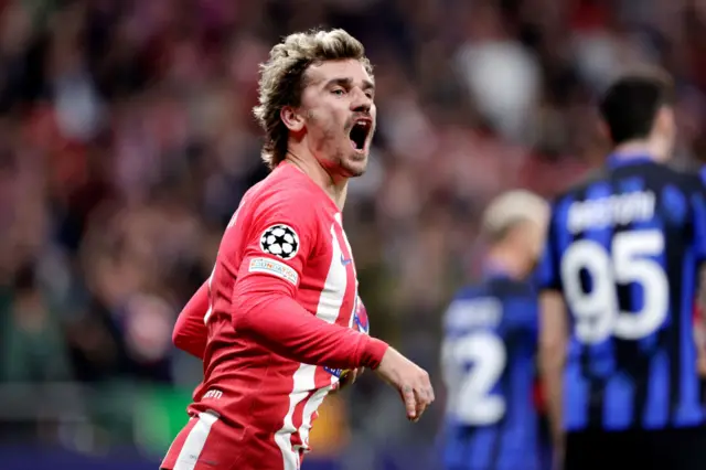 Antoine Griezmann celebrates for Atletico Madrid