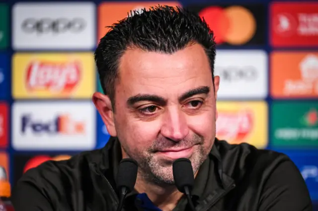 Xavi doing press conference