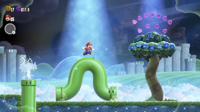 Mario runs along a green pipe which has transformed into a worm.