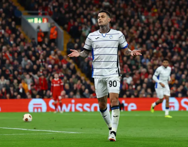 Gianluca Scamacca celebrates.