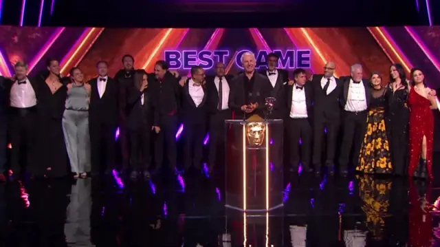 Baldur's Gate 3's development team on stage after winning best game award