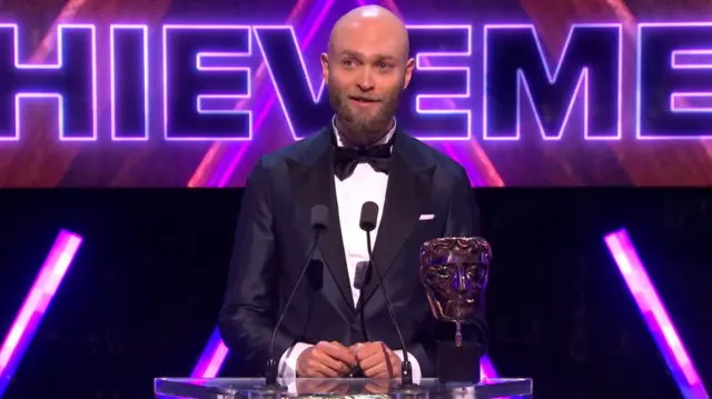 Sapani speaks at the Bafta lectern