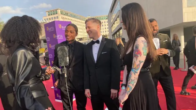 Spider-Man 2 stars Yuri Lowenthal and Nadji Jeter talk to the BBC on the red carpet