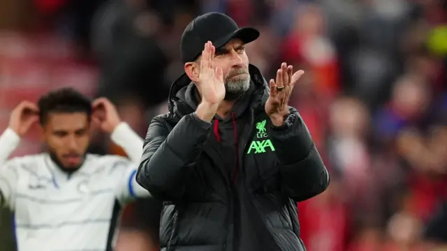 Jurgen Klopp applauds the Liverpool fans after losing to Atalanta at Anfield