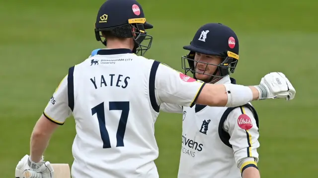 Rob Yates hugs Alex Davies