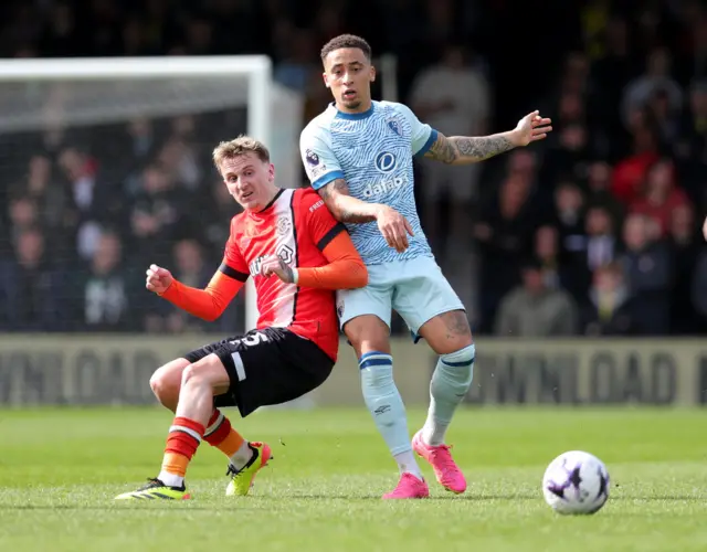 Luton Town's Alfie Doughty challenges Bournemouth's Marcus Tavernier