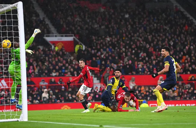 Bournemouth striker Philip Billing heads in the second goal past Manchester United goalkeeper Andre Onana