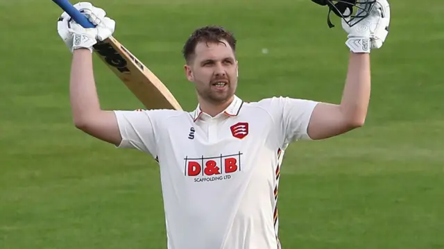 Matt Critchley celebrates scoring century for Essex