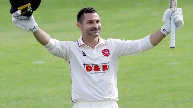 Dean Elgar celebrates scoring a century