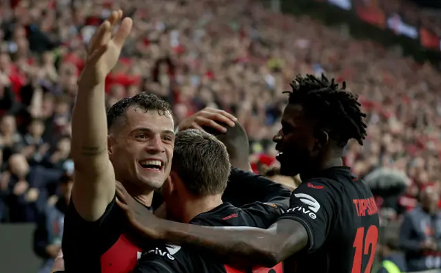 Jonas Hofmann of Bayer Leverkusen celebrates with team mates