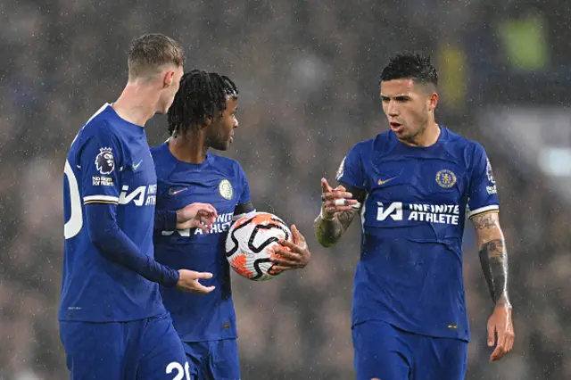 Cole Palmer, Raheem Sterling and Enzo Fernades speak during a game