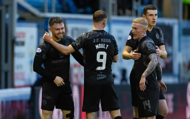 Dundee United's Glenn Middleton, Louis Moult and Craig Sibbald celebrate