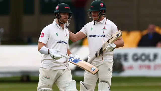 Liam Trevaskis celebrates scoring a half-century