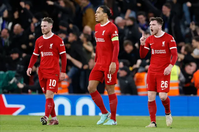 Alexis Mac Allister, Virgil van Dijk and Andrew Robertson of Liverpool look dejected