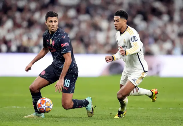 Rodri playing for Manchester City against Real Madrid